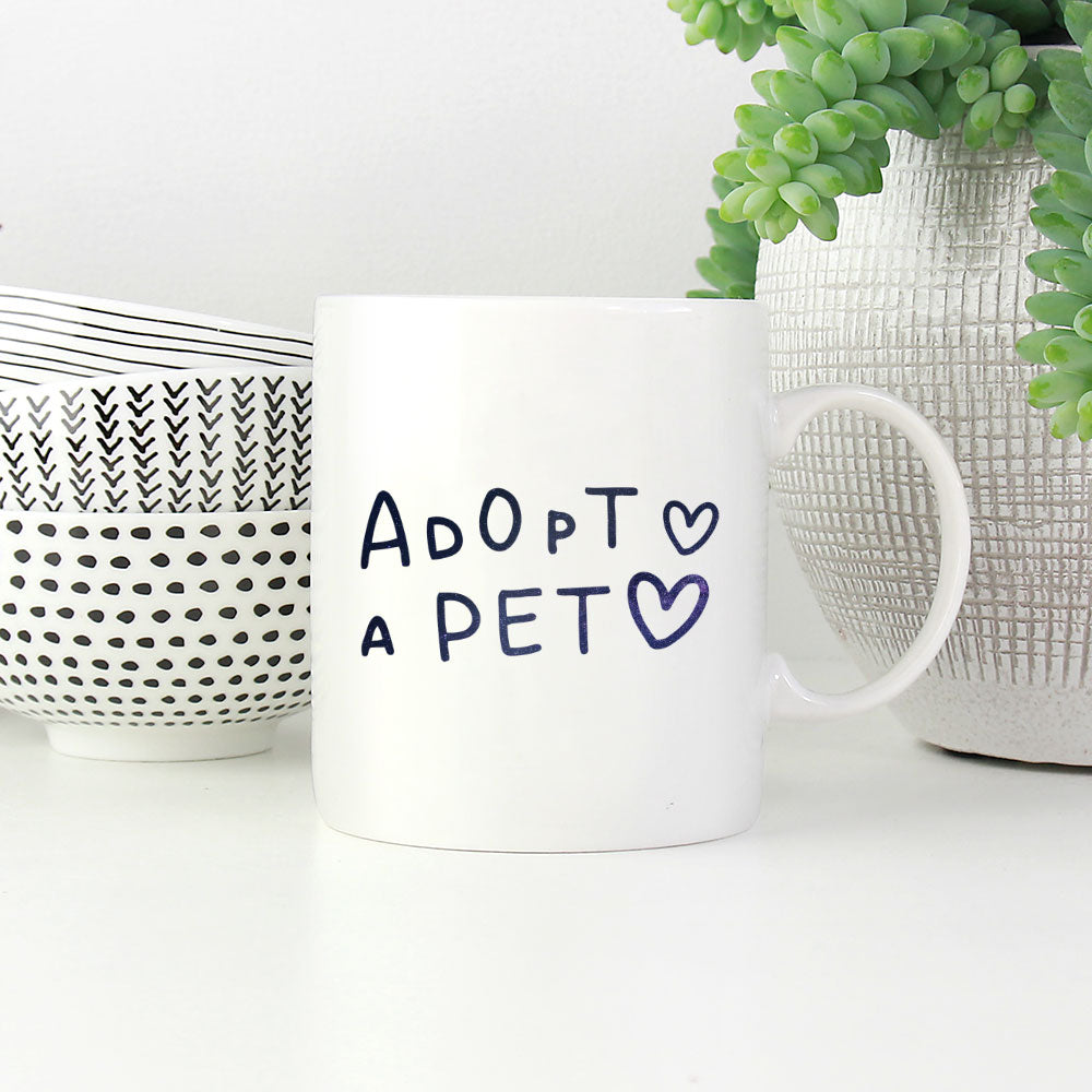 Adopt A Pet with Green Galaxy font Mugs at $13.95 found at Personalizedpetlovergifts