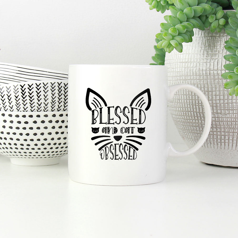 Blessed And Cat Obsessed With Paws Coffee Mug at $13.95 found at Personalizedpetlovergifts