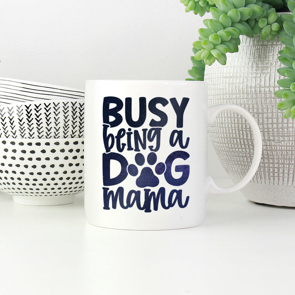 Busy Being A Dog Mama with Green Galaxy font Mugs at $13.95 found at Personalizedpetlovergifts