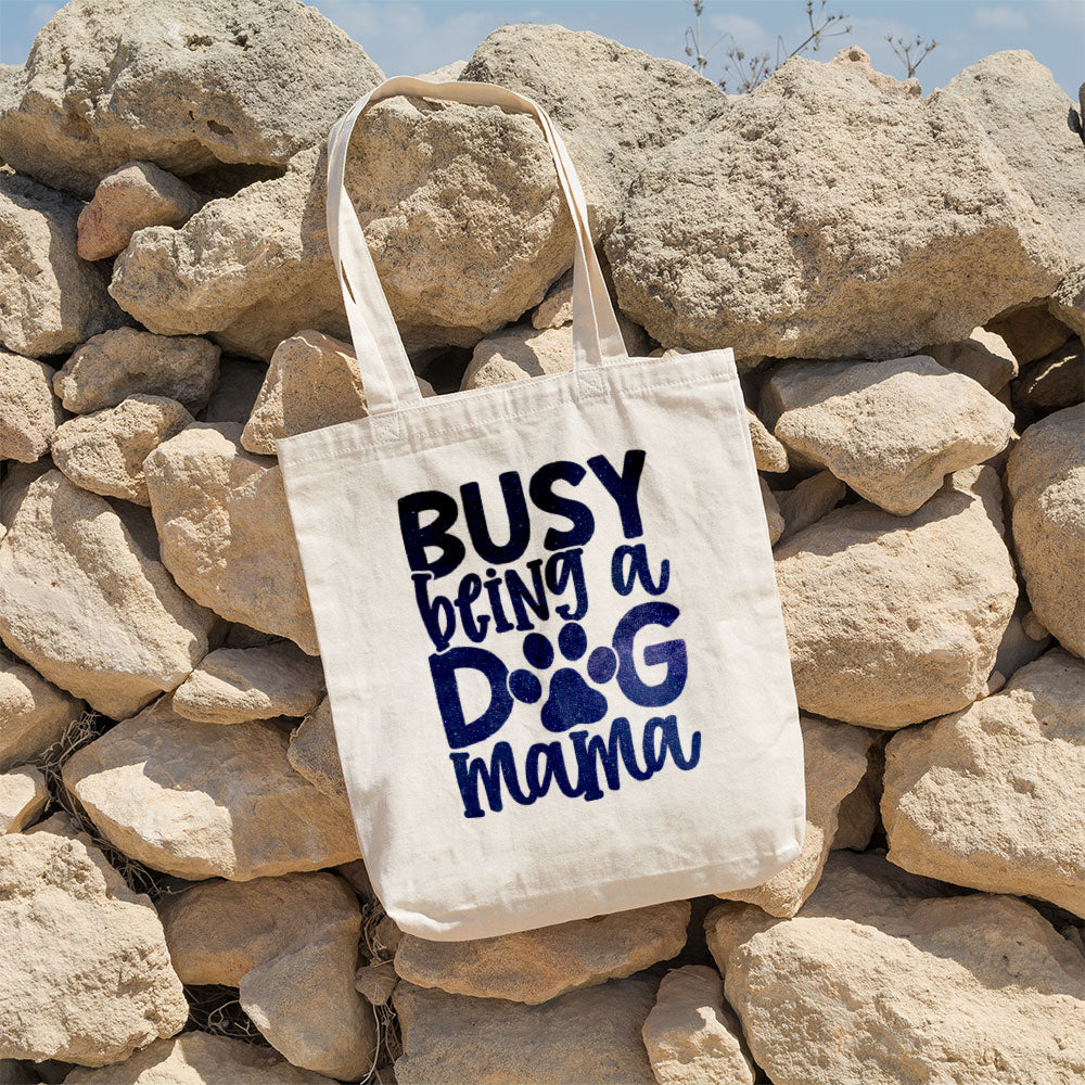 Busy Being A Dog Mama With Green Galaxy Font Totes at $22.95 found at Personalizedpetlovergifts