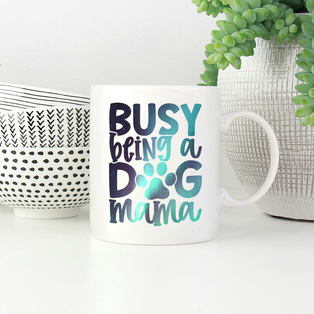 Busy Being A Dog Mama With Paw Mugs at $13.95 found at Personalizedpetlovergifts