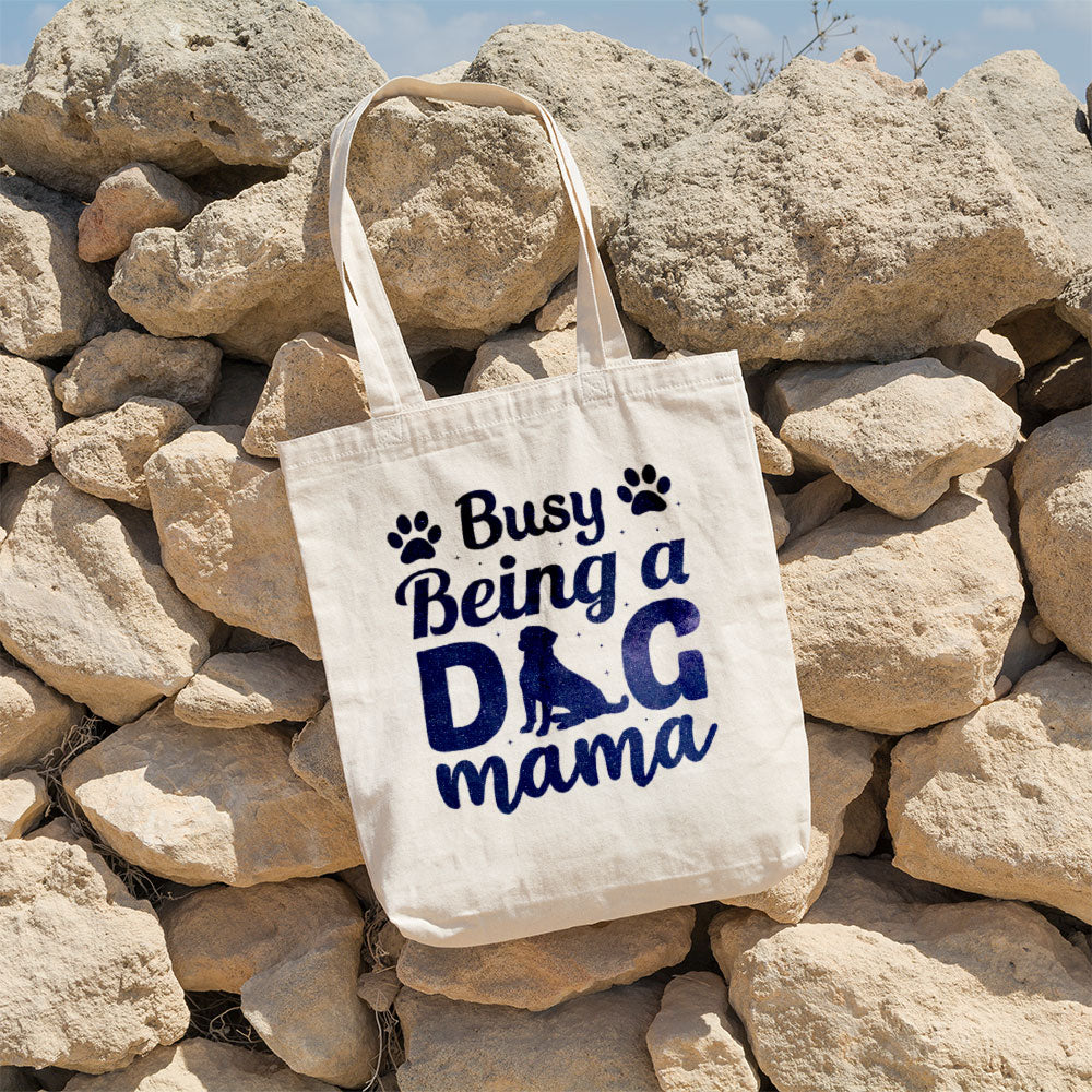 Busy Being A Dog Mama With Paw With Green Galaxy Font Totes at $22.95 found at Personalizedpetlovergifts