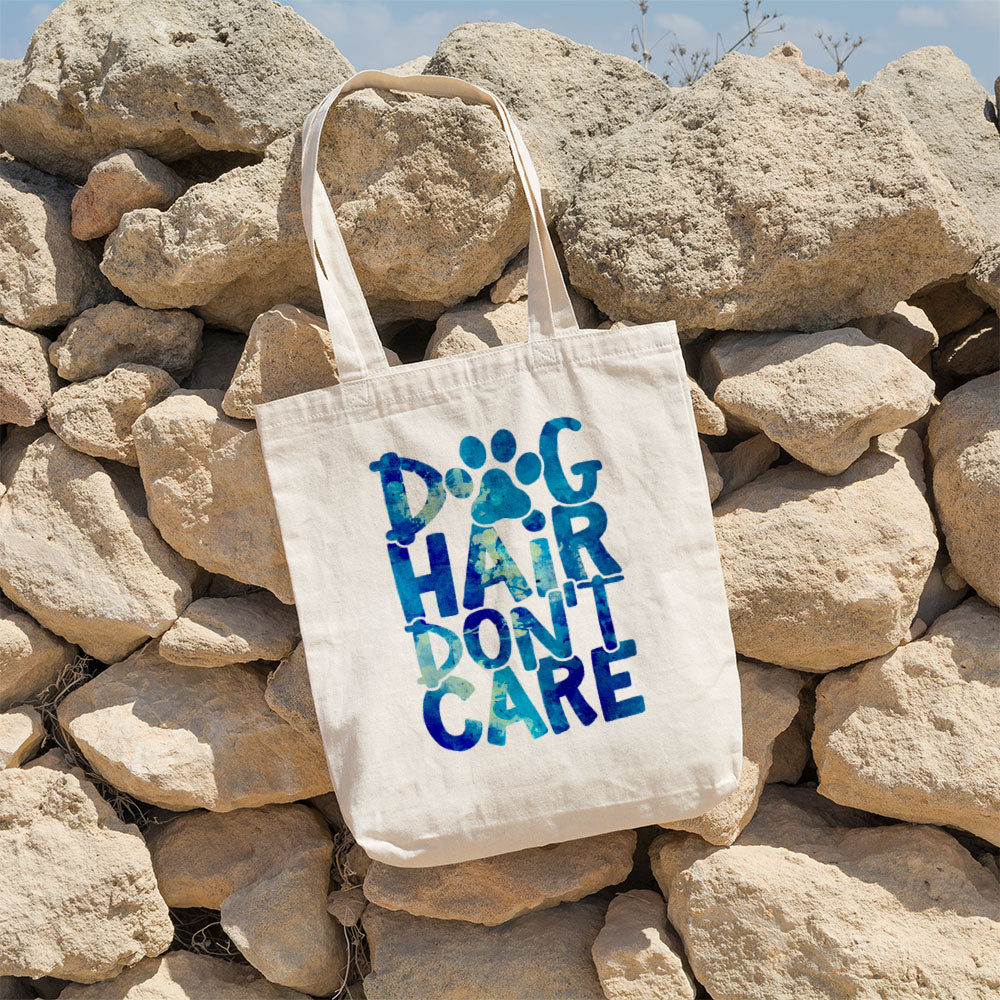 Dog Hair Don_t Care With A Paw With Blue Paint Font Totes at $22.95 found at Personalizedpetlovergifts