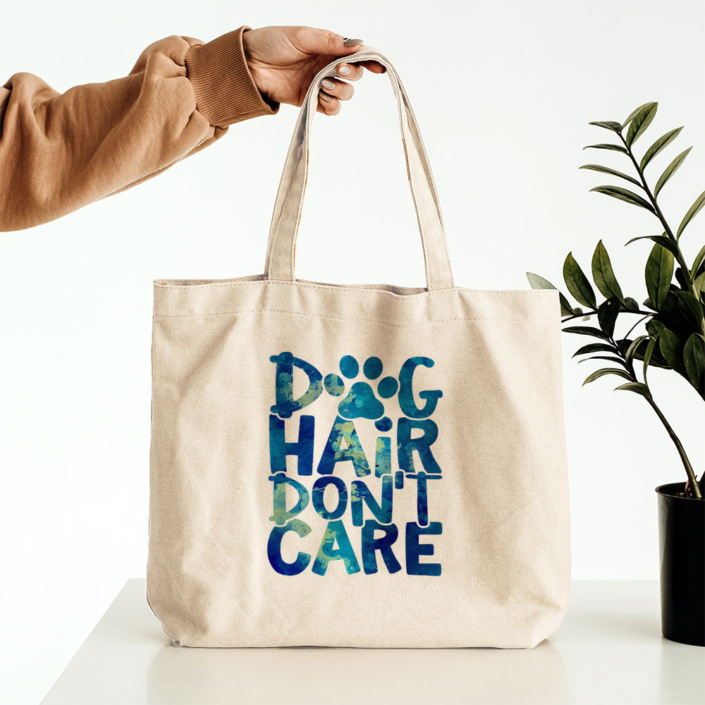 Dog Hair Don_t Care With A Paw With Blue Paint Font Totes at $22.95 found at Personalizedpetlovergifts