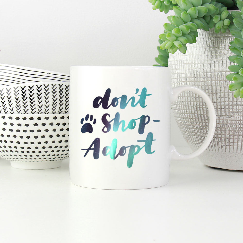 Don_t Shop Adopt with Green Galaxy font Mugs at $13.95 found at Personalizedpetlovergifts