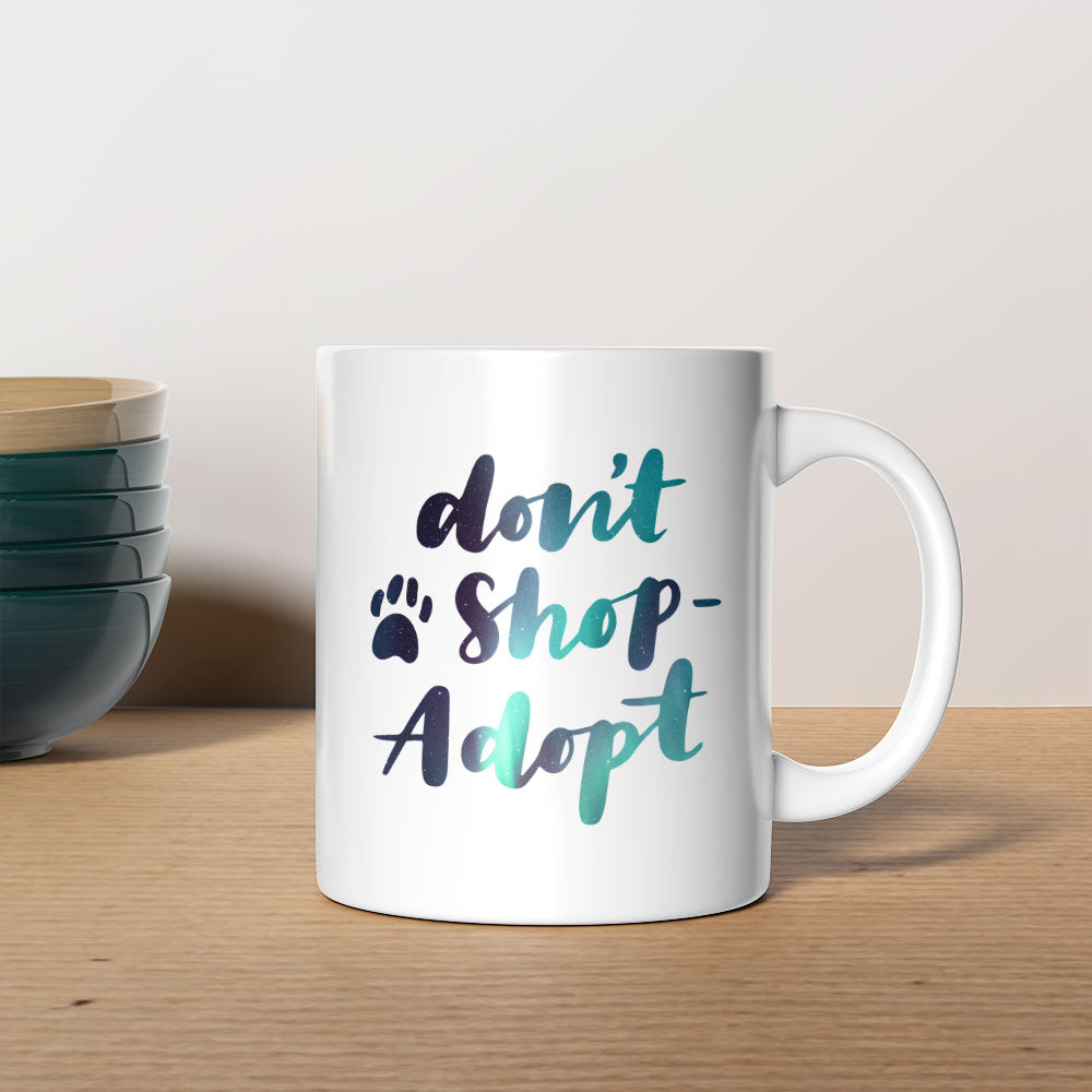 Don_t Shop Adopt with Green Galaxy font Mugs at $13.95 found at Personalizedpetlovergifts