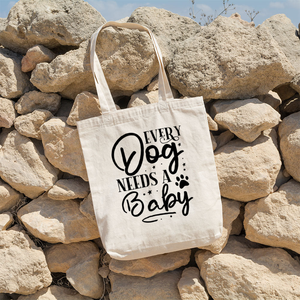 Every Dog Needs A Baby Totes at $22.95 found at Personalizedpetlovergifts