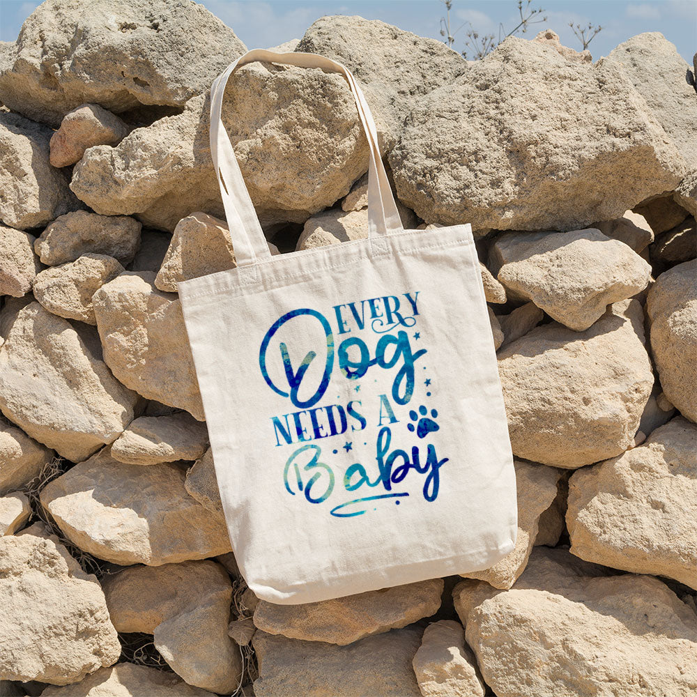 Every Dog Needs A Baby With Blue Paint Font Totes at $22.95 found at Personalizedpetlovergifts