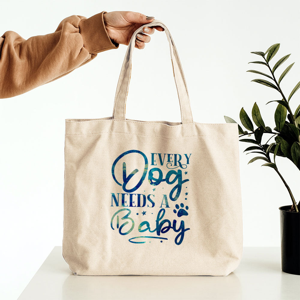 Every Dog Needs A Baby With Blue Paint Font Totes at $22.95 found at Personalizedpetlovergifts