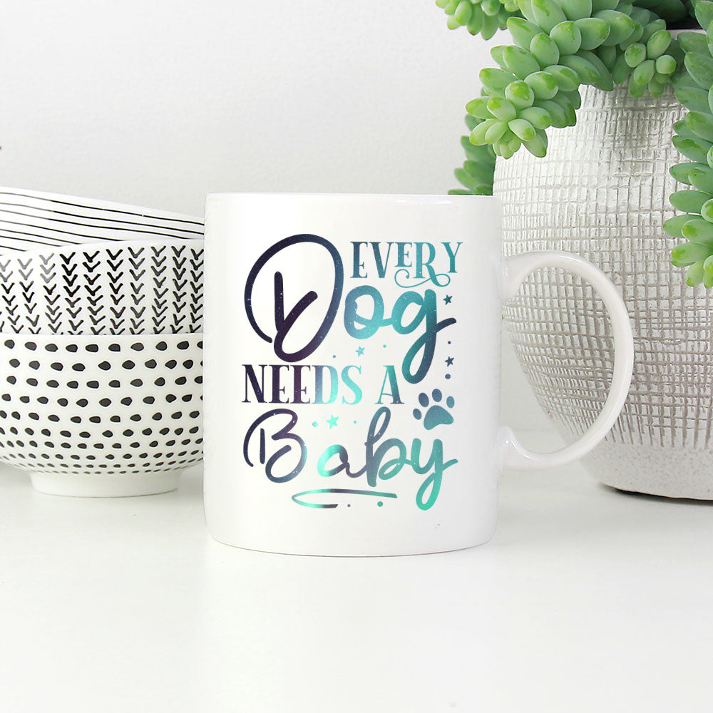 Every Dog Needs A Baby with Green Galaxy font Mugs at $13.95 found at Personalizedpetlovergifts