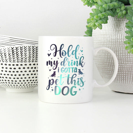 Hold My Drink I Gotta Pet This Dog with Green Galaxy font Mugs at $13.95 found at Personalizedpetlovergifts