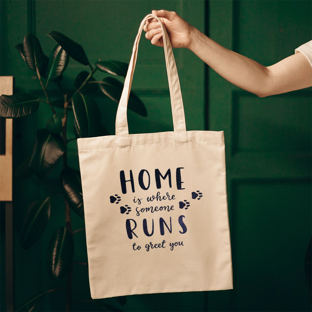 Home Is Where Someone Runs To Greet You With Green Galaxy Font Totes at $22.95 found at Personalizedpetlovergifts