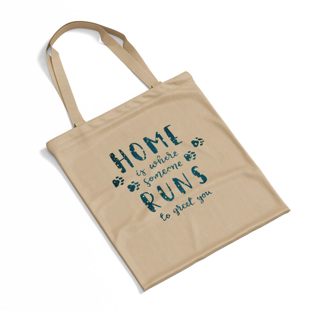 Home Is Where Someone Runs To Greet You With Paws With Blue Gradient Font Totes at $22.95 found at Personalizedpetlovergifts