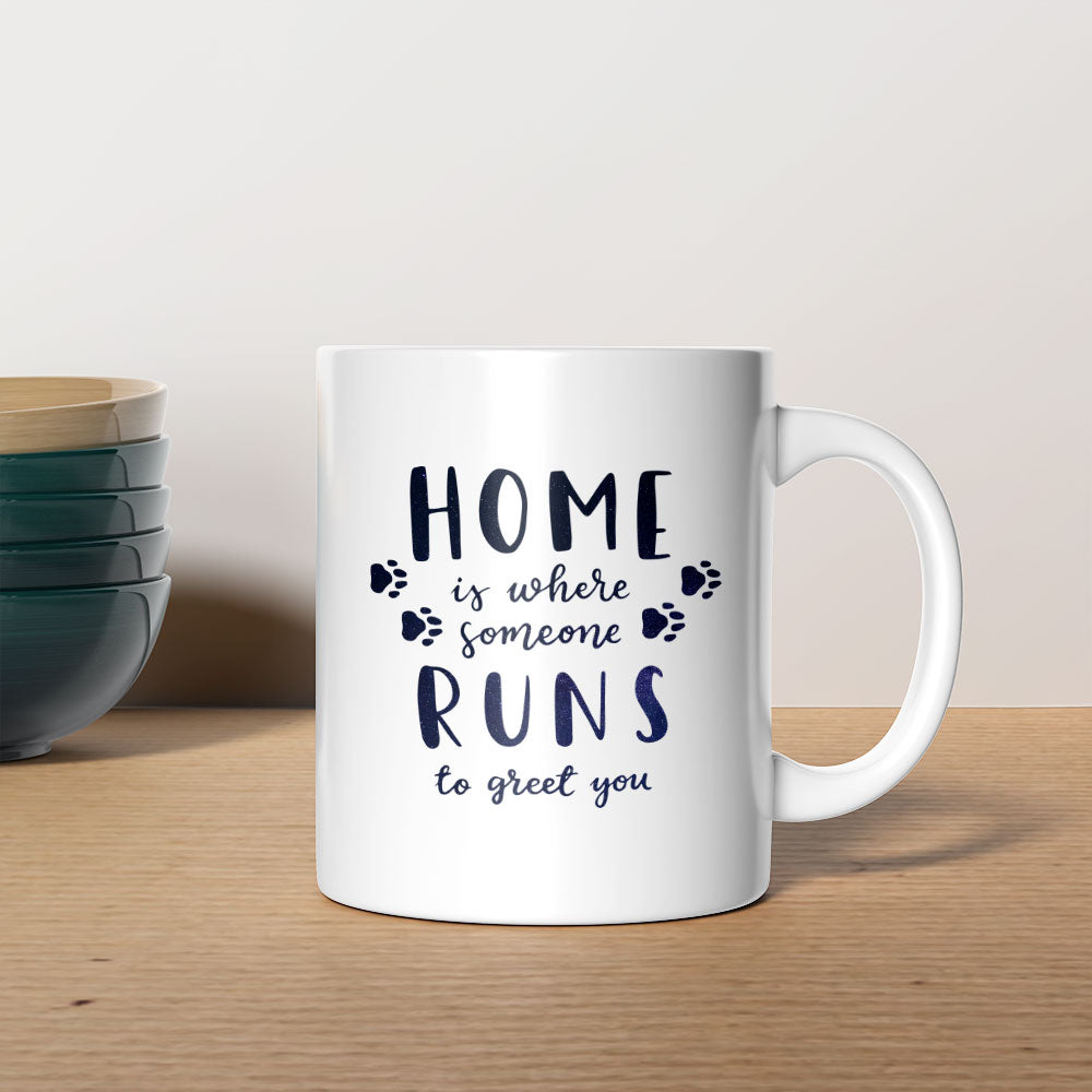 Home Is Where Someone Runs To Greet You With Paws with Green Galaxy font Mugs at $13.95 found at Personalizedpetlovergifts