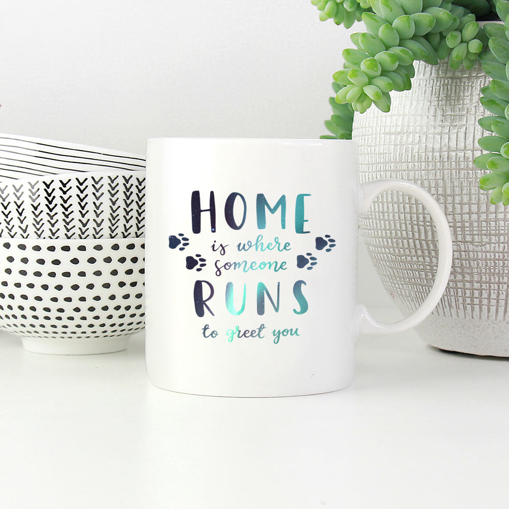 Home Is Where Someone Runs To Greet You With Paws with star font Mugs at $13.95 found at Personalizedpetlovergifts