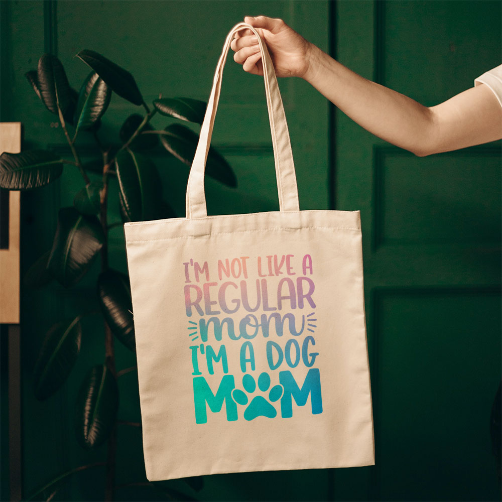 I_m Not Like A Regular Mom I_m A Dog Mom With Blue Gradient Font Totes at $22.95 found at Personalizedpetlovergifts