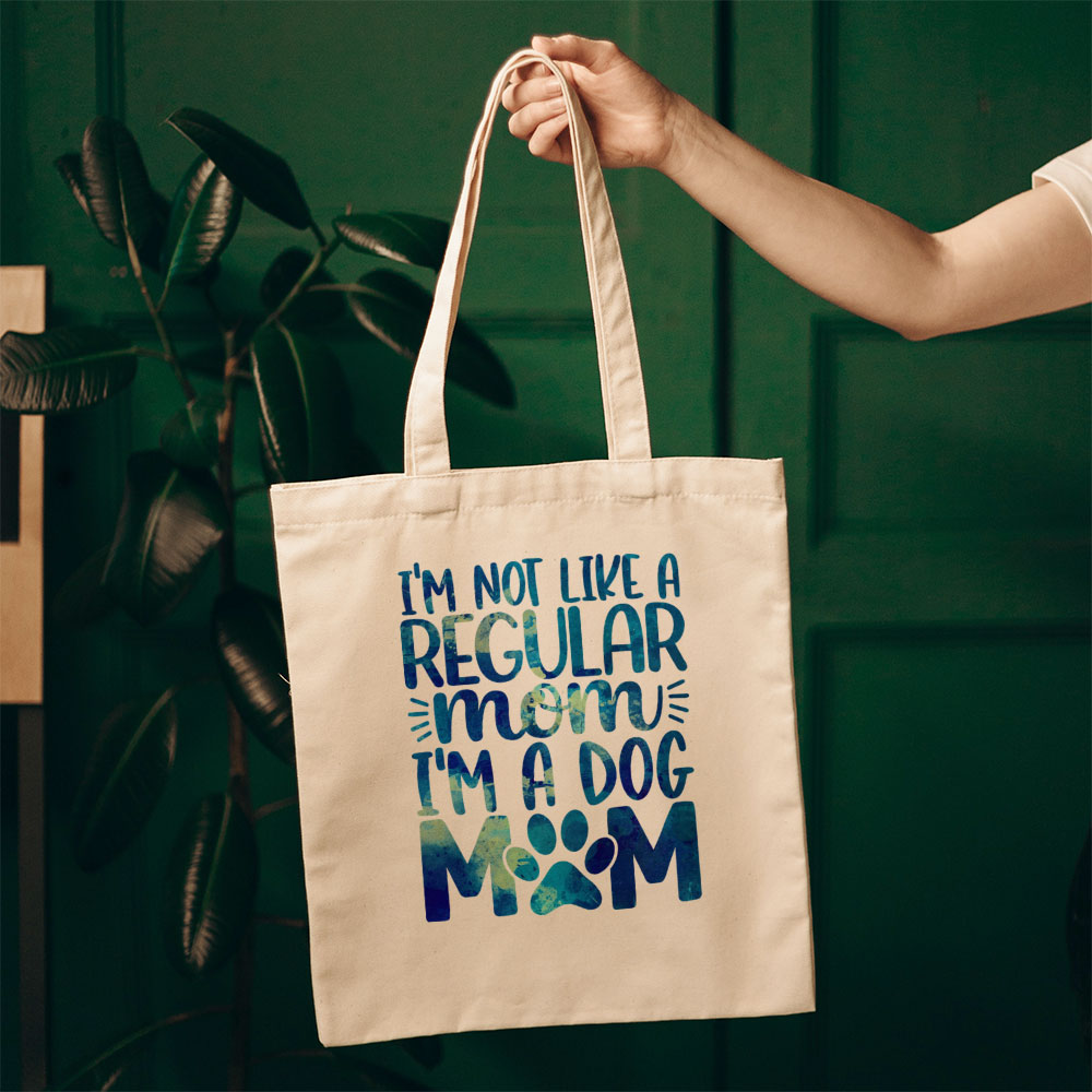 I_m Not Like A Regular Mom I_m A Dog Mom With Blue Paint Font Totes at $22.95 found at Personalizedpetlovergifts