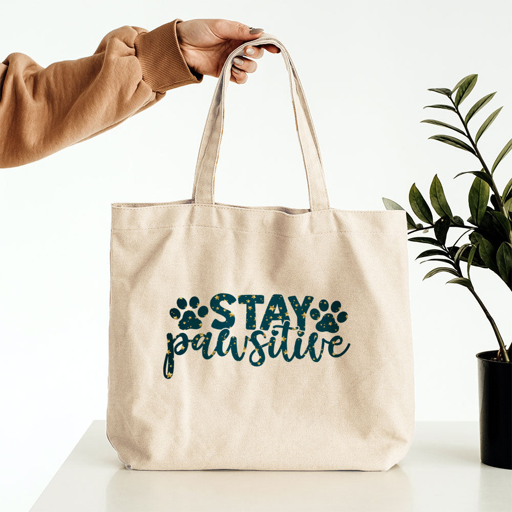 Stay Pawsitive With Paws With Blue Gradient Font Totes at $22.95 found at Personalizedpetlovergifts