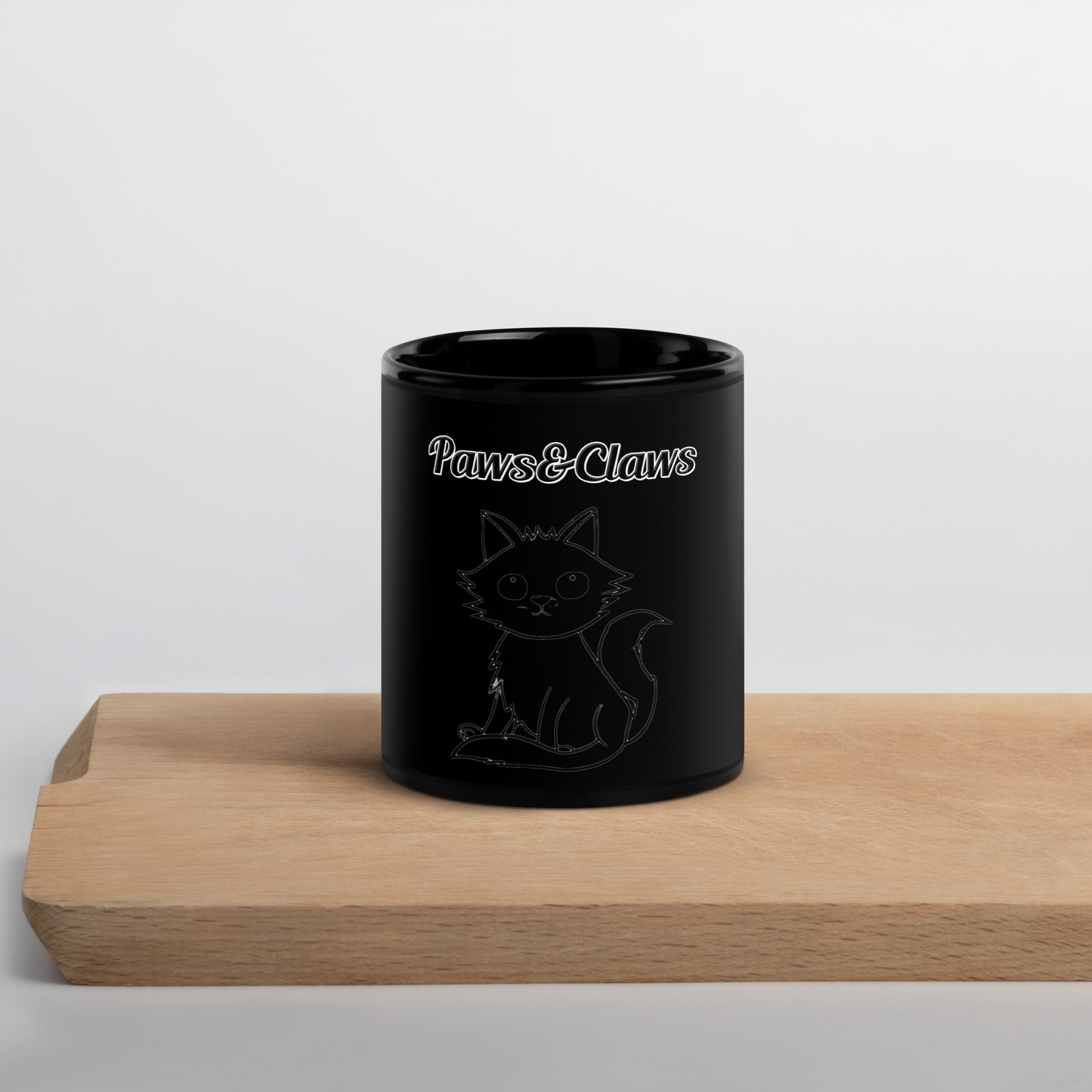 Black Glossy Mug with text Wispy Kitten Line Art with a text "Paws&Claws" at $17.99 found at Personalizedpetlovergifts