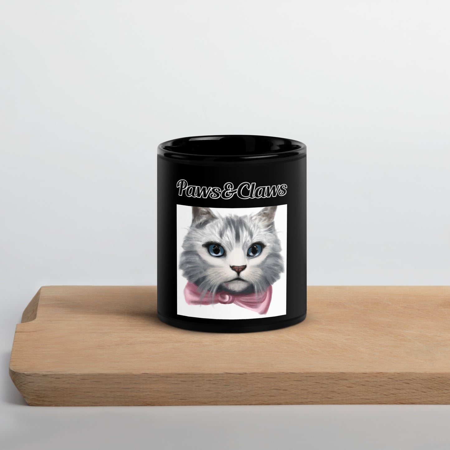 Black Glossy Mug with text White Kitten With a Pink Bow with a text "Paws&Claws" at $17.99 found at Personalizedpetlovergifts