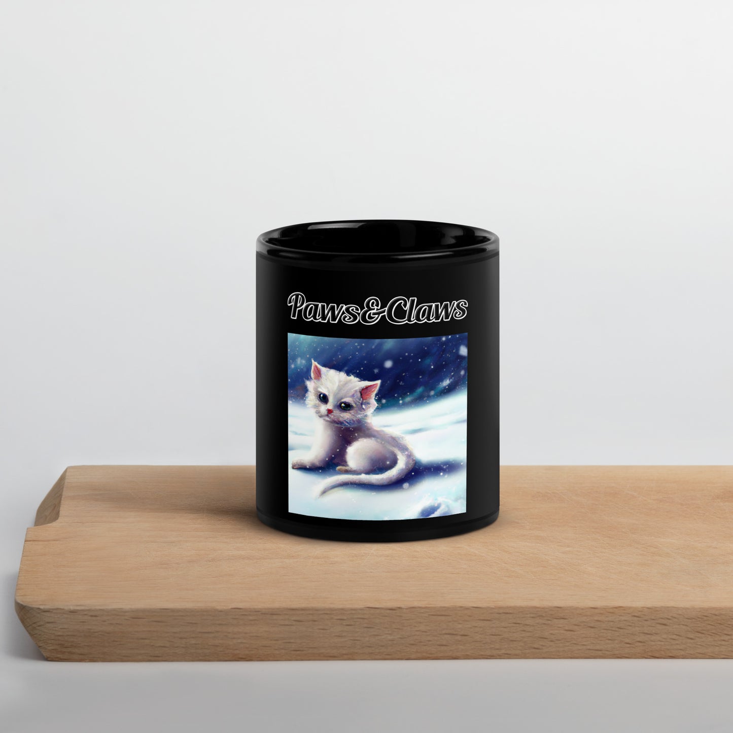 Black Glossy Mug with text White Kitten In The Snow with a text "Paws&Claws" at $17.99 found at Personalizedpetlovergifts