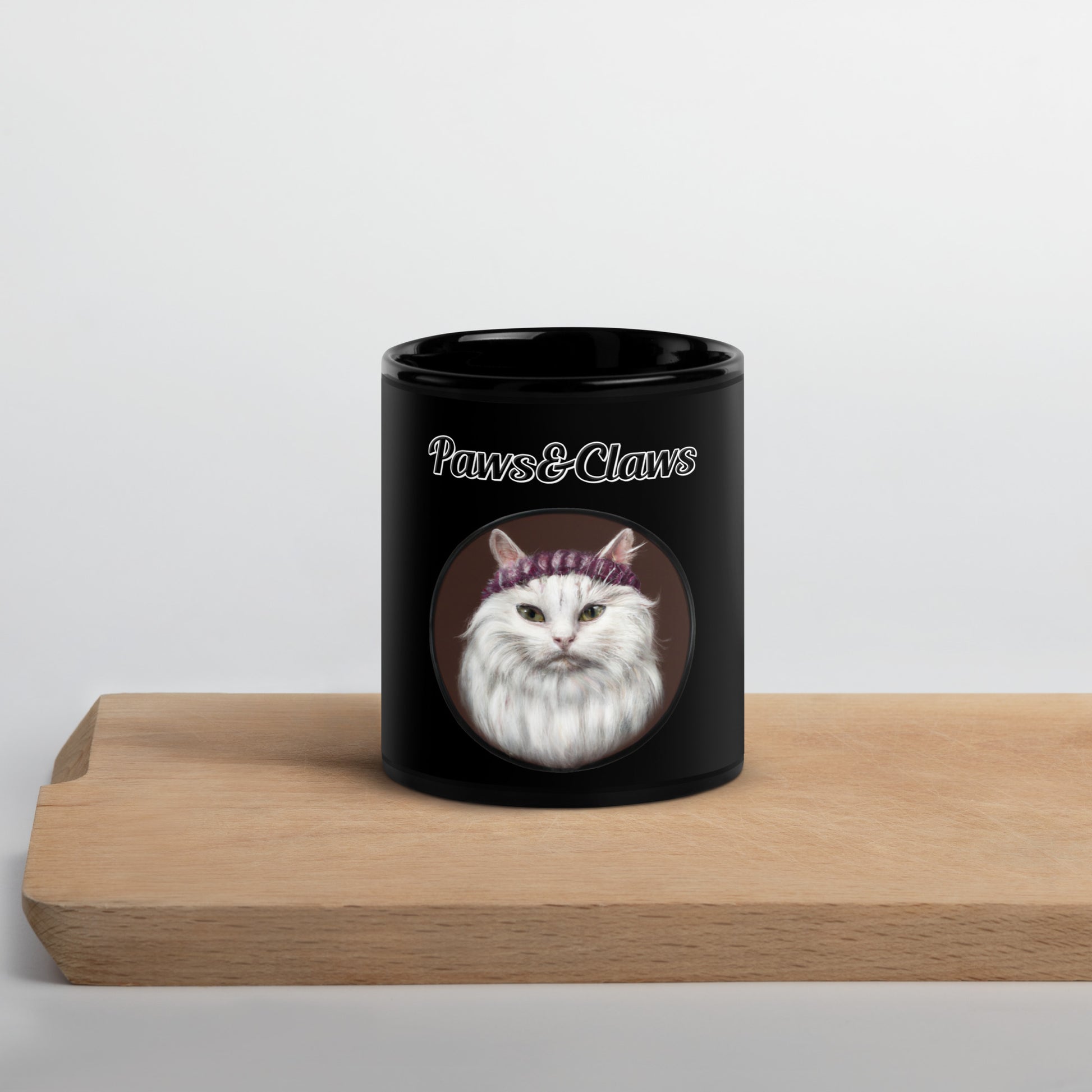 Black Glossy Mug with text White Fluffy Kitten With a Knit Headband with a text "Paws&Claws" at $17.99 found at Personalizedpetlovergifts