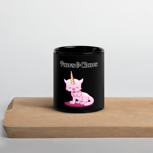 Black Glossy Mug with text Unicorn Cat Licking Its Paw with a text "Paws&Claws" at $17.99 found at Personalizedpetlovergifts