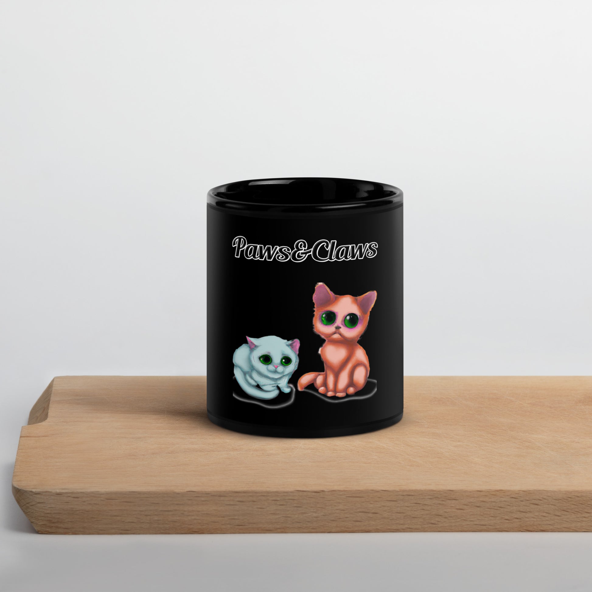 Black Glossy Mug with text Two Kittens Sitting with a text "Paws&Claws" at $17.99 found at Personalizedpetlovergifts