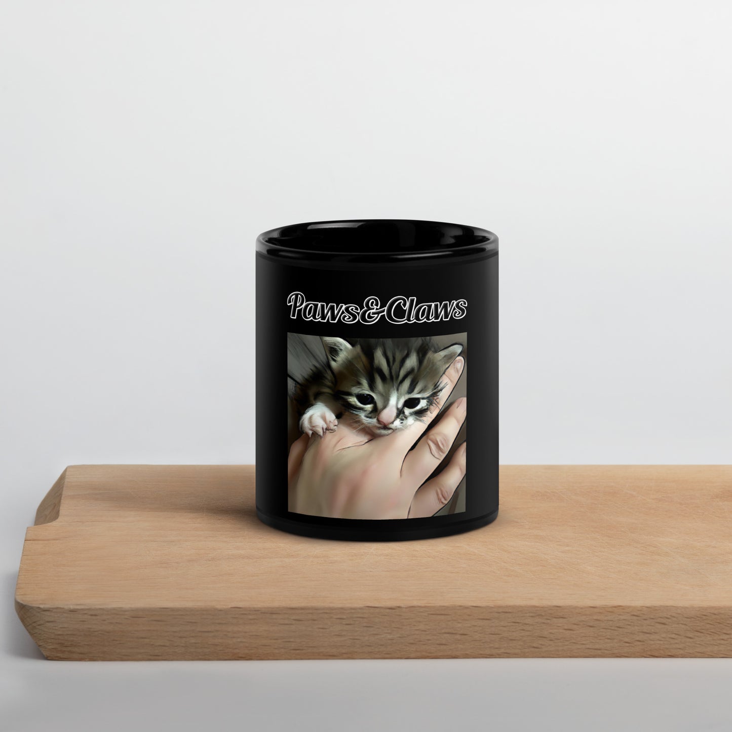 Black Glossy Mug with text Tiny Kitten In Hand with a text "Paws&Claws" at $17.99 found at Personalizedpetlovergifts