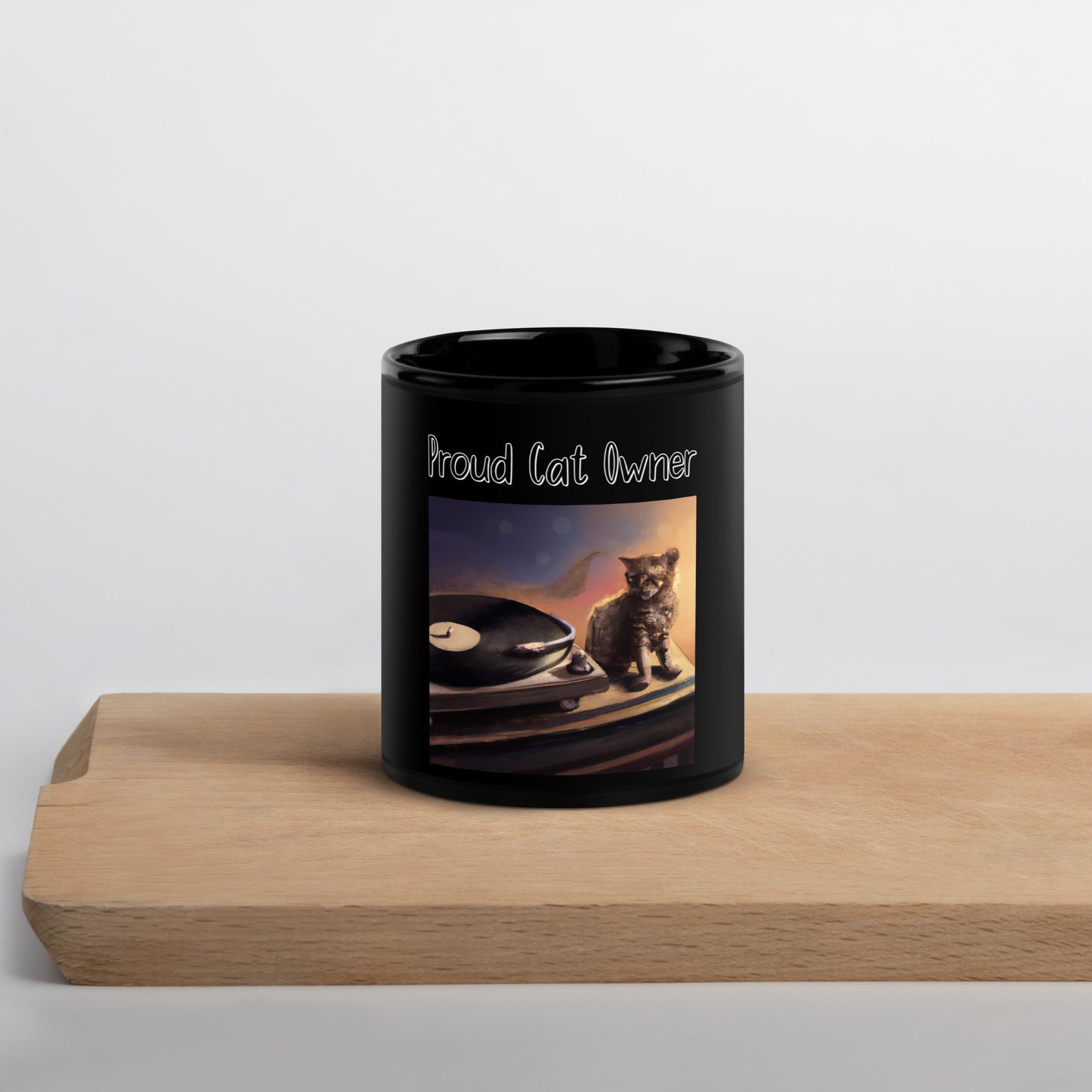 Black Glossy Mug with Kitten With a Vinyl Player with a text "Proud Cat Owner" at $25.97 found at Personalizedpetlovergifts