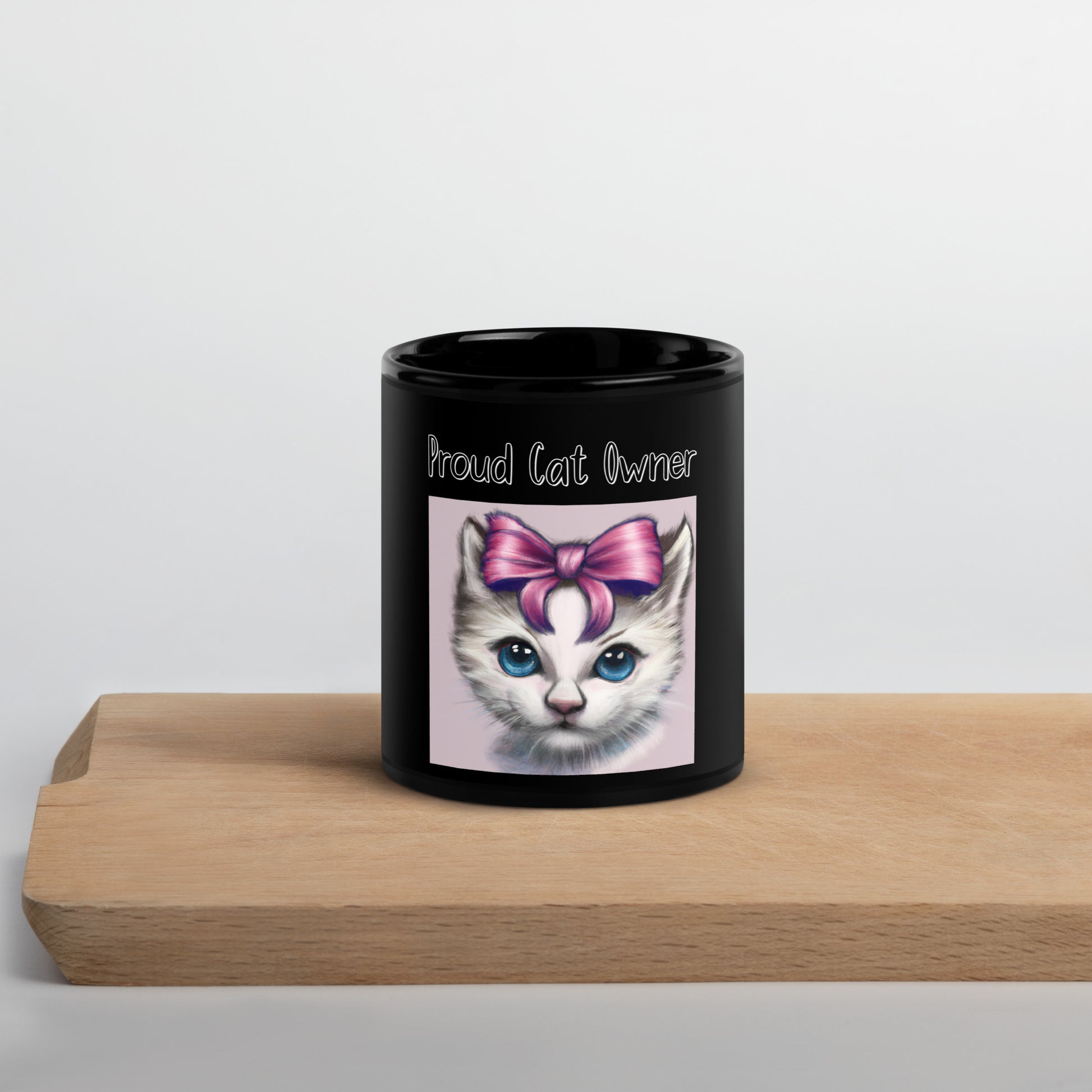 Black Glossy Mug with Kitten With a Bow with a text "Proud Cat Owner" at $25.97 found at Personalizedpetlovergifts