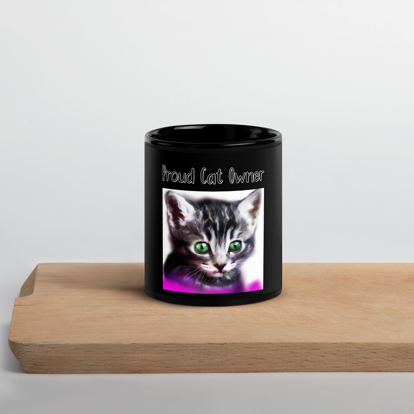 Black Glossy Mug with Kitten Portrait With Green Eyes with a text "Proud Cat Owner" at $25.97 found at Personalizedpetlovergifts