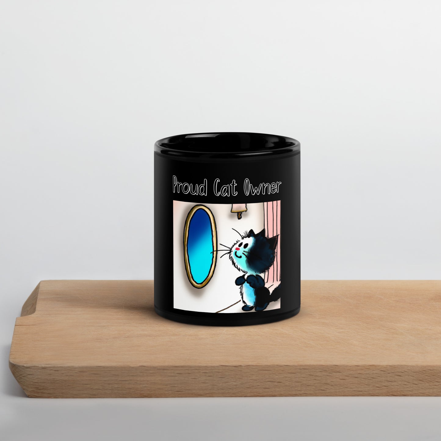 Black Glossy Mug with Kitten Looking In The Mirror with a text "Proud Cat Owner" at $25.97 found at Personalizedpetlovergifts