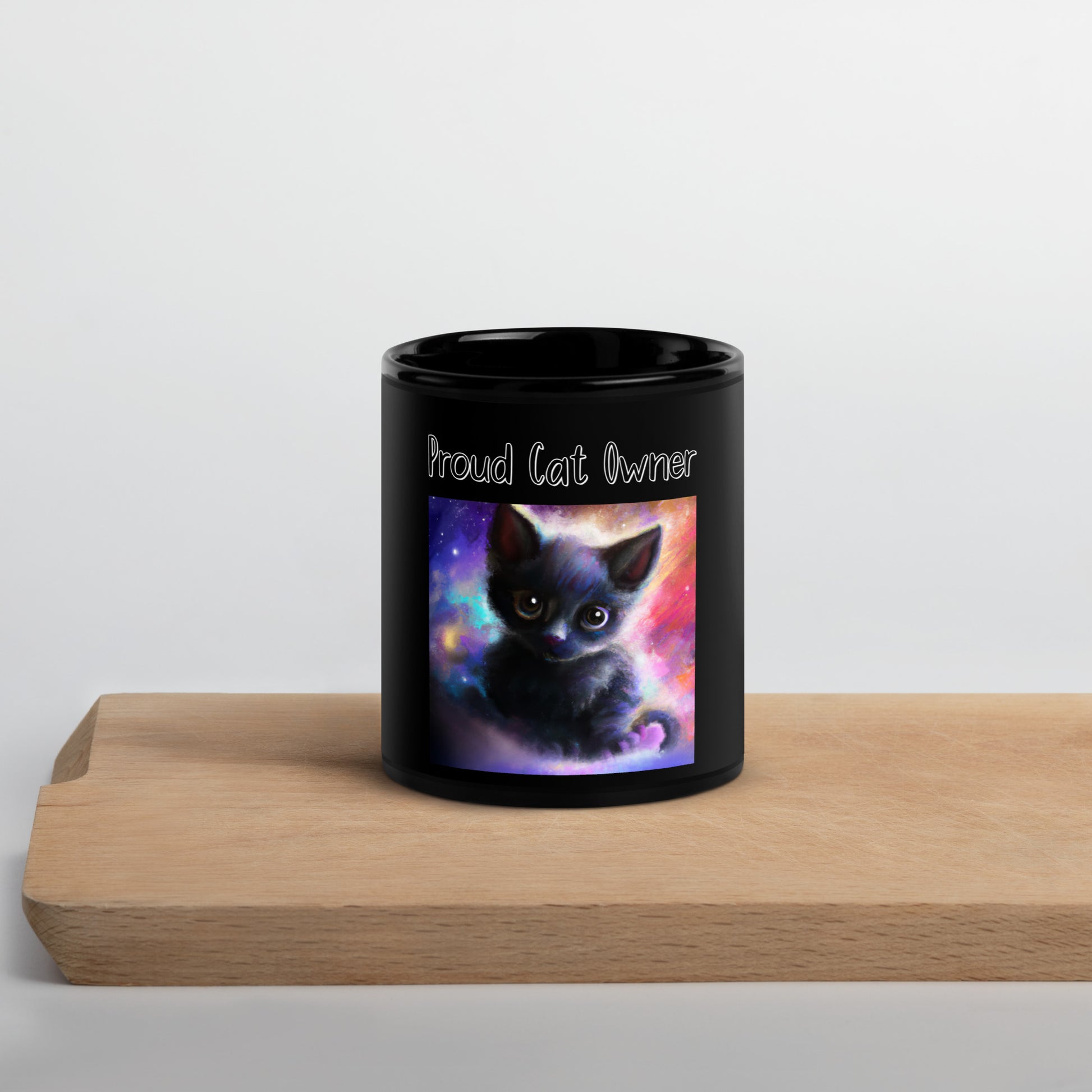 Black Glossy Mug with Kitten In The Galaxy with a text "Proud Cat Owner" at $25.97 found at Personalizedpetlovergifts