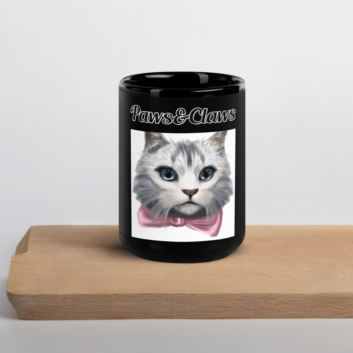 Black Glossy Mug with text White Kitten With a Pink Bow with a text "Paws&Claws" at $17.99 found at Personalizedpetlovergifts