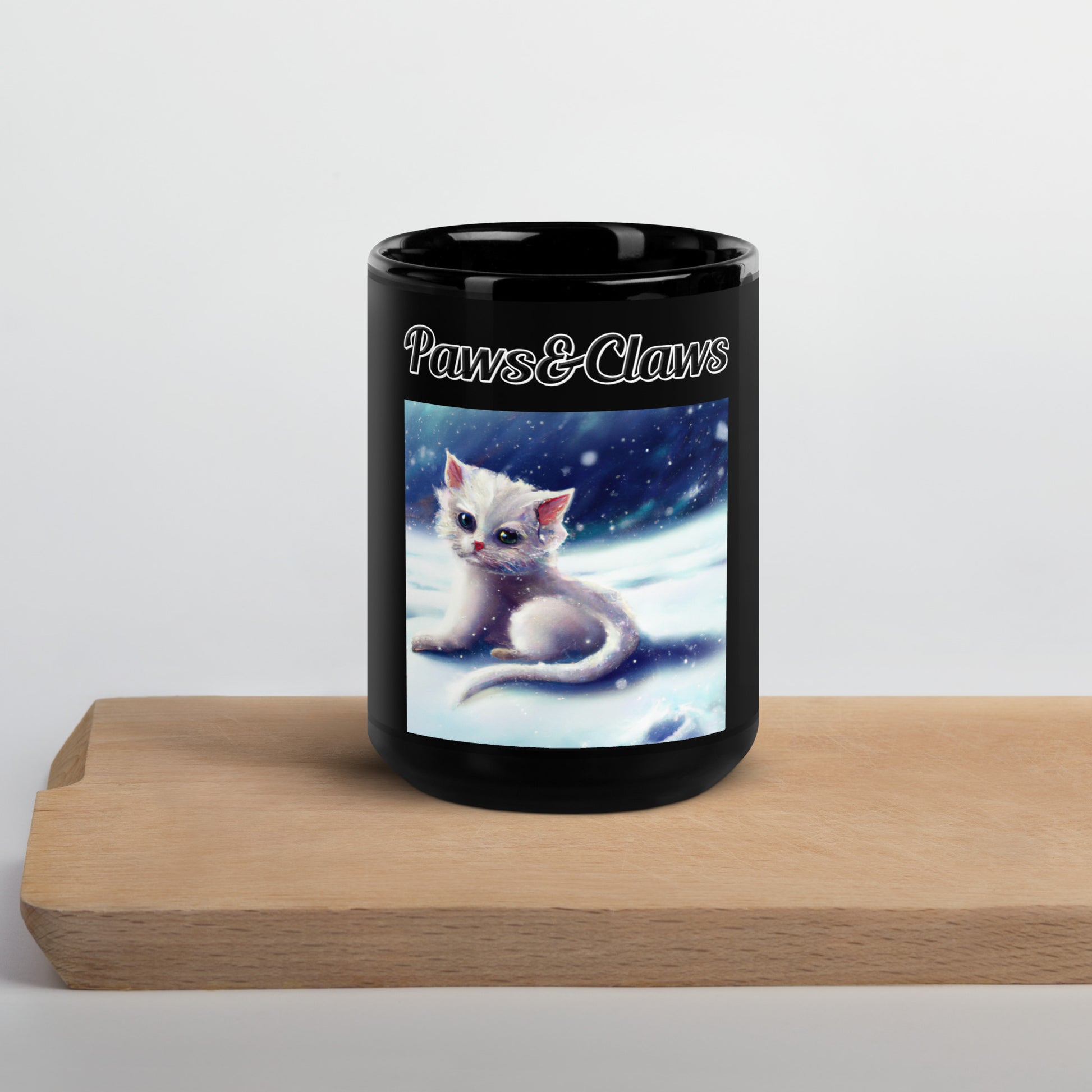 Black Glossy Mug with text White Kitten In The Snow with a text "Paws&Claws" at $17.99 found at Personalizedpetlovergifts