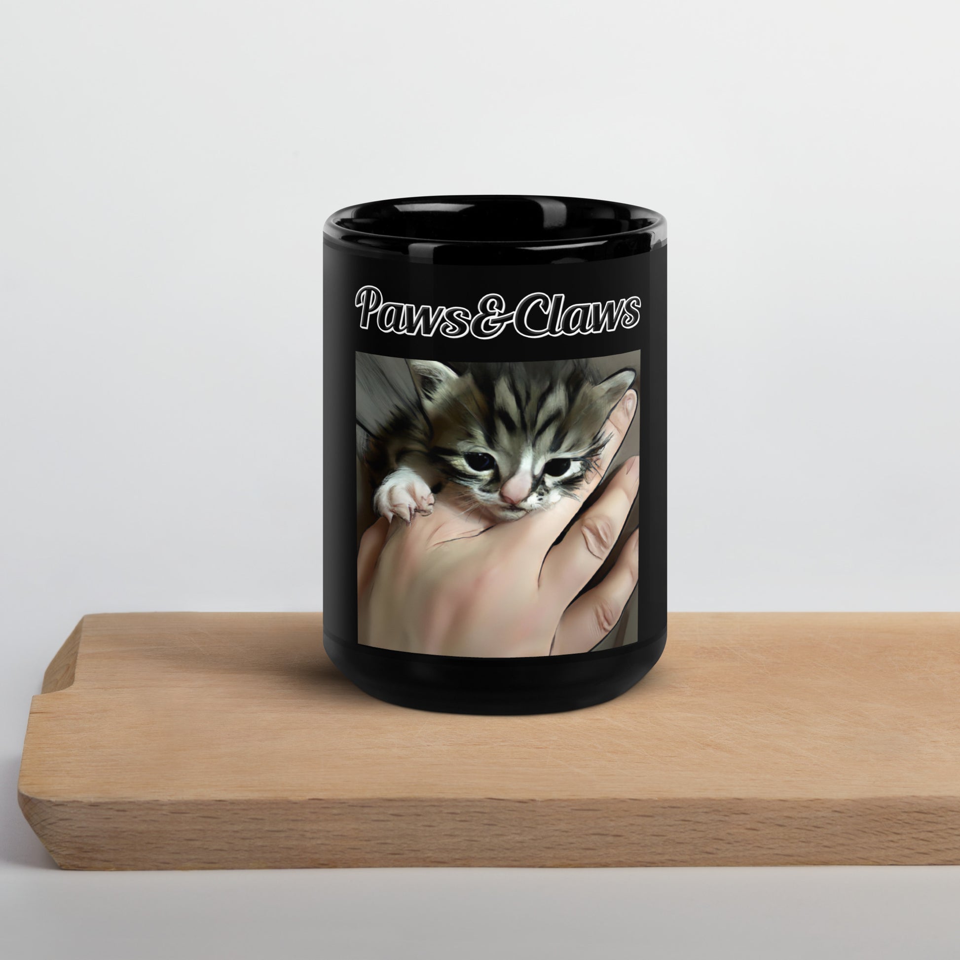 Black Glossy Mug with text Tiny Kitten In Hand with a text "Paws&Claws" at $17.99 found at Personalizedpetlovergifts