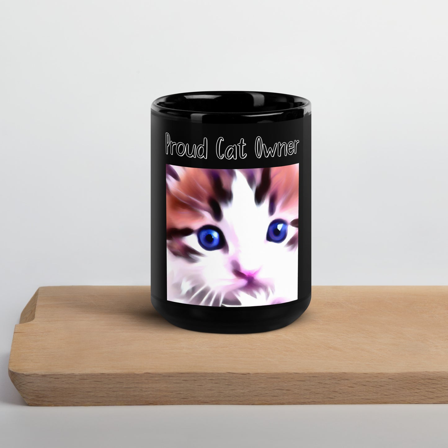 Black Glossy Mug with Kitten With Blue Eyes with a text "Proud Cat Owner" at $25.97 found at Personalizedpetlovergifts