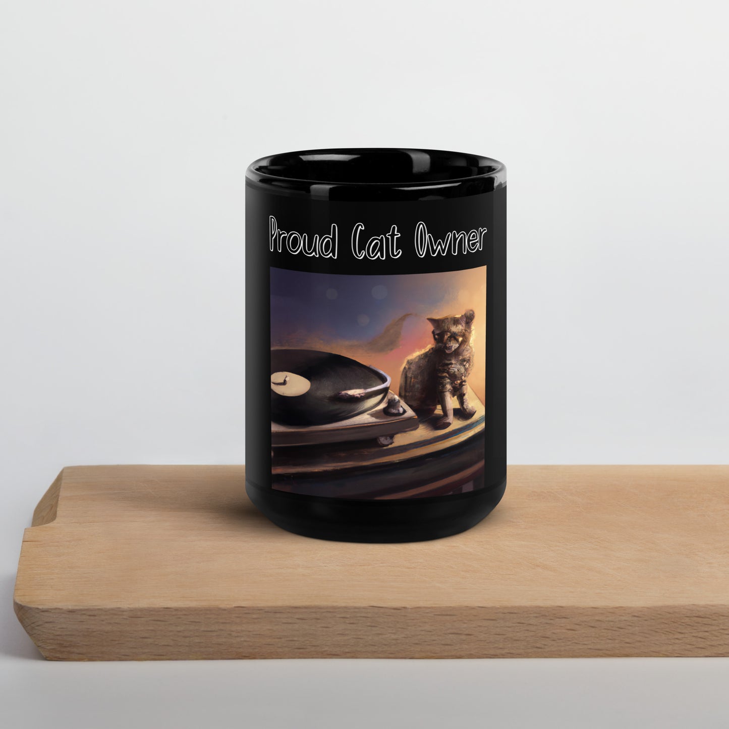 Black Glossy Mug with Kitten With a Vinyl Player with a text "Proud Cat Owner" at $25.97 found at Personalizedpetlovergifts