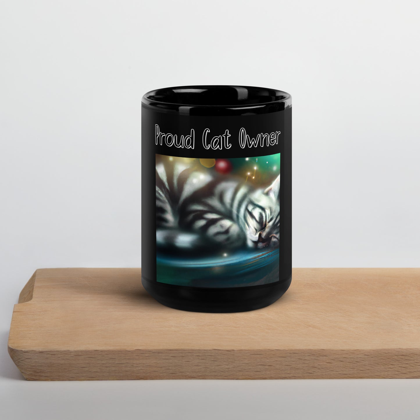 Black Glossy Mug with Kitten Sleeping with a text "Proud Cat Owner" at $25.97 found at Personalizedpetlovergifts