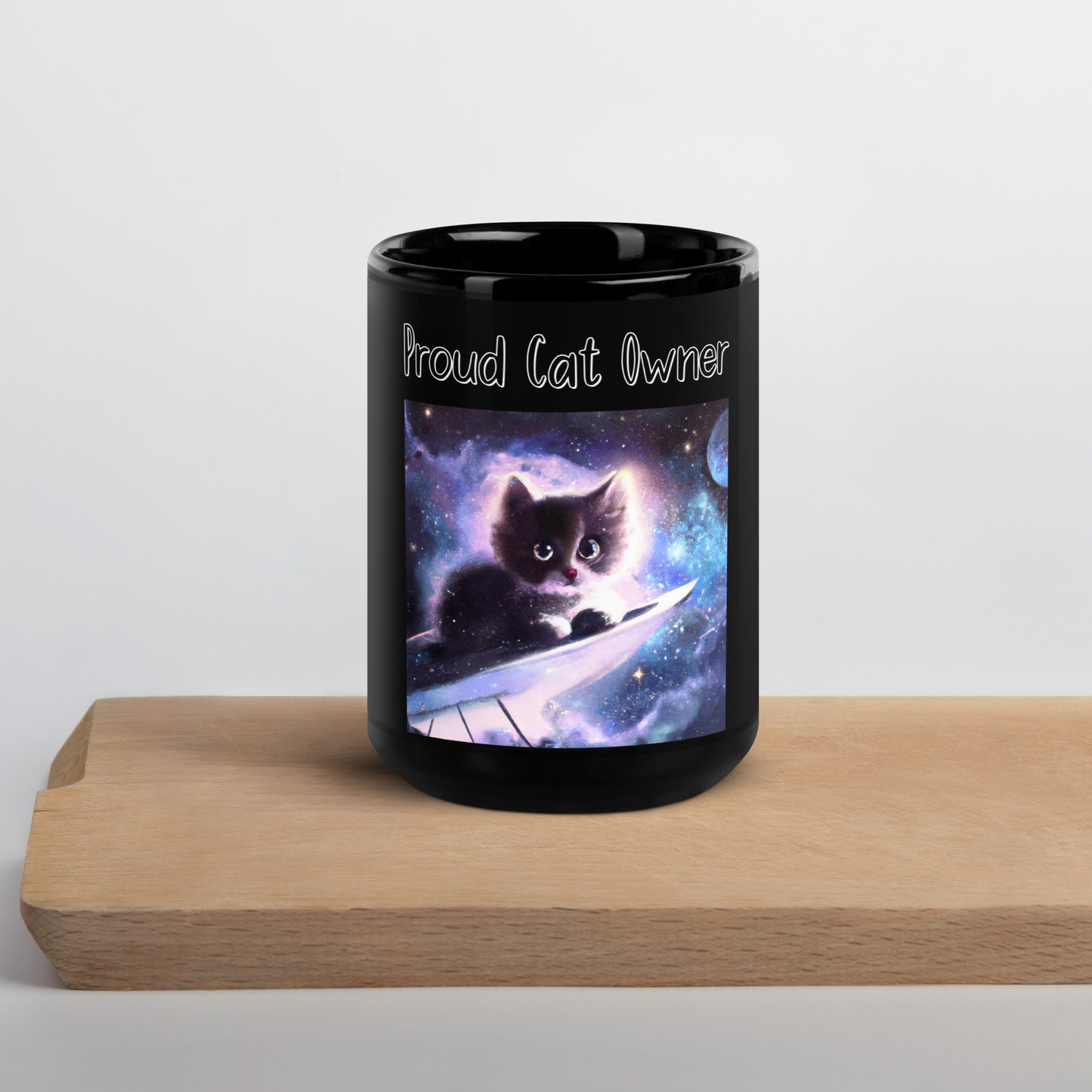 Black Glossy Mug with Kitten Sitting In The Space with a text "Proud Cat Owner" at $25.97 found at Personalizedpetlovergifts