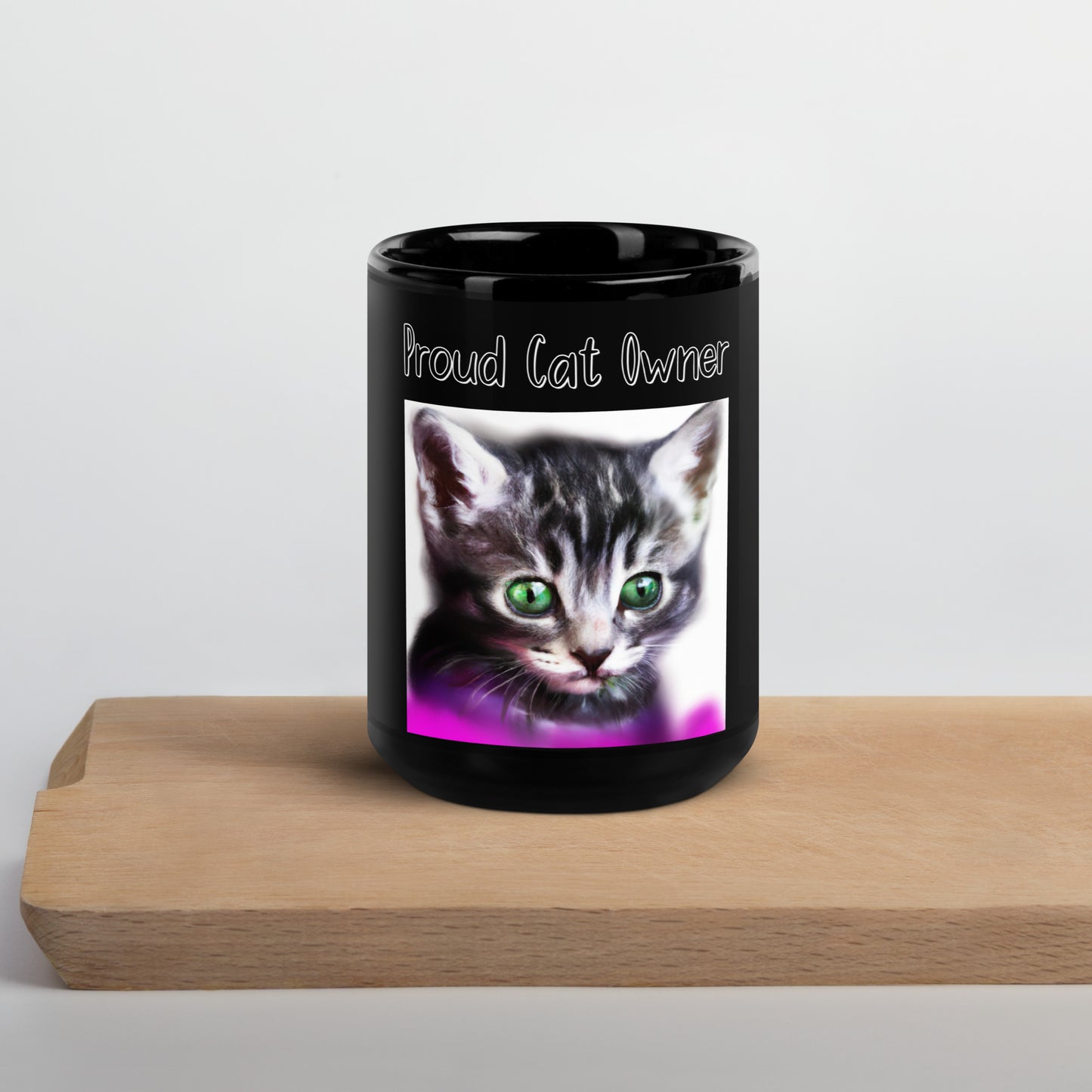 Black Glossy Mug with Kitten Portrait With Green Eyes with a text "Proud Cat Owner" at $25.97 found at Personalizedpetlovergifts