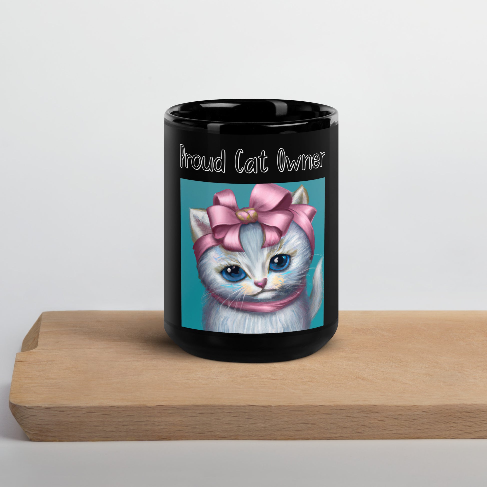 Black Glossy Mug with Kitten Portrait With a Pink Bow with a text "Proud Cat Owner" at $25.97 found at Personalizedpetlovergifts