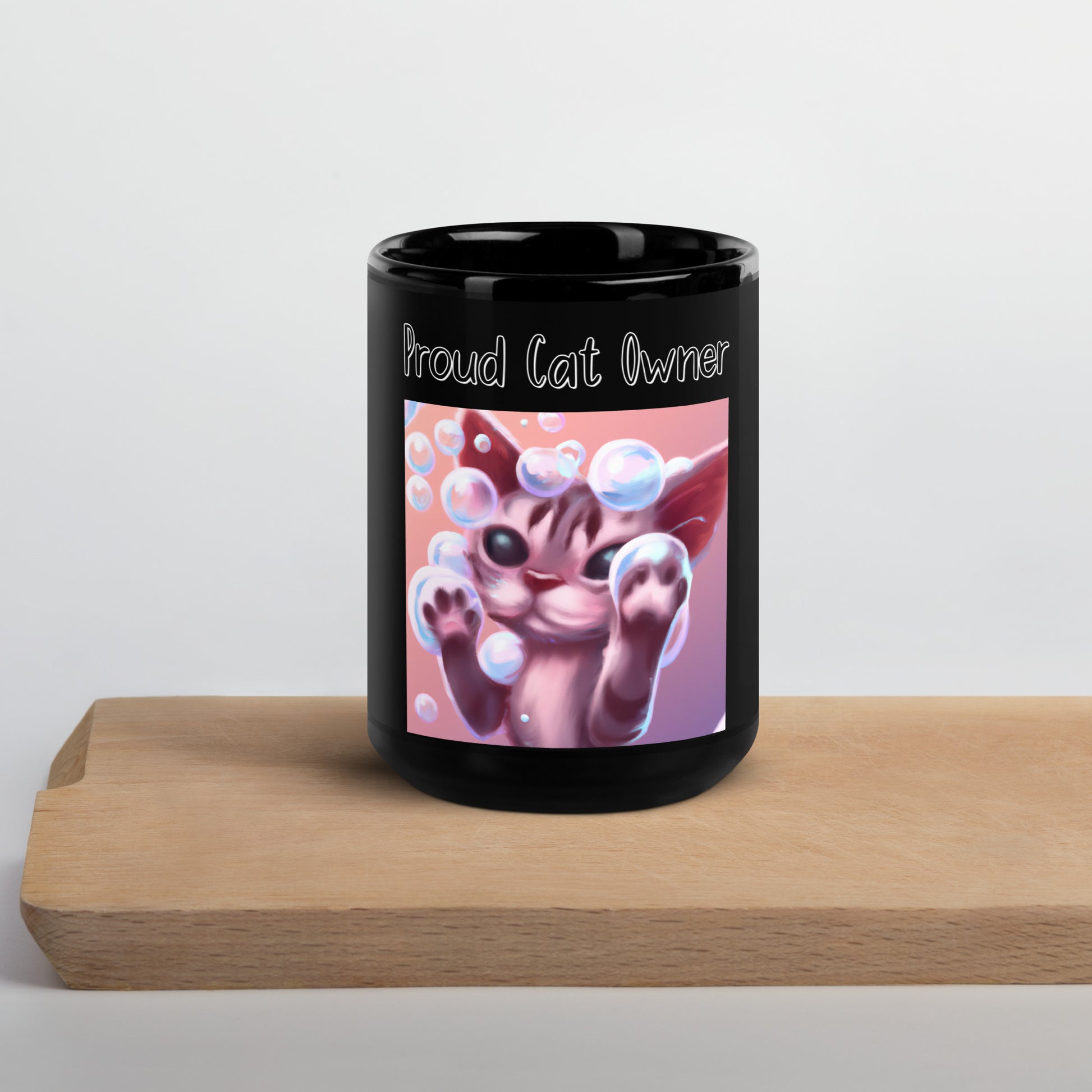 Black Glossy Mug with Kitten Playing With Soap Bubbles with a text "Proud Cat Owner" at $25.97 found at Personalizedpetlovergifts