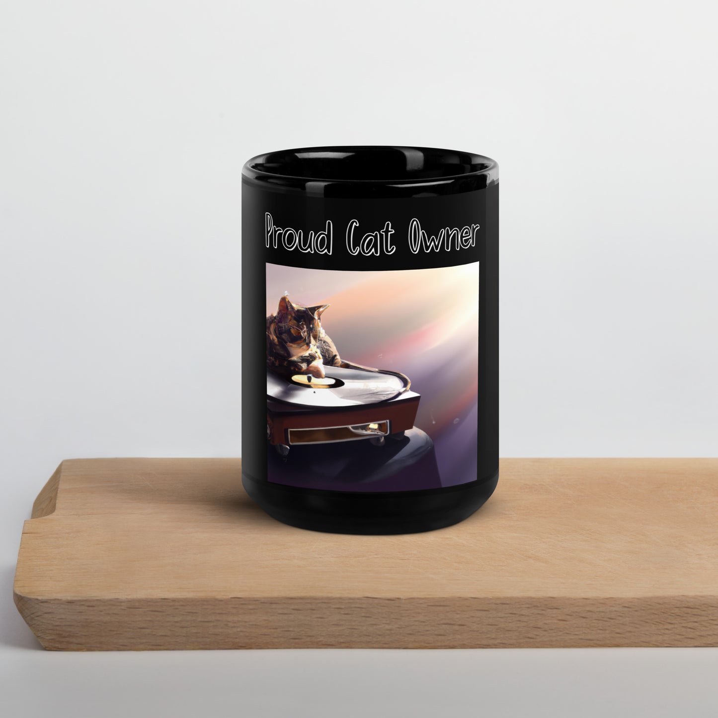 Black Glossy Mug with Kitten On A Vinyl with a text "Proud Cat Owner" at $25.97 found at Personalizedpetlovergifts