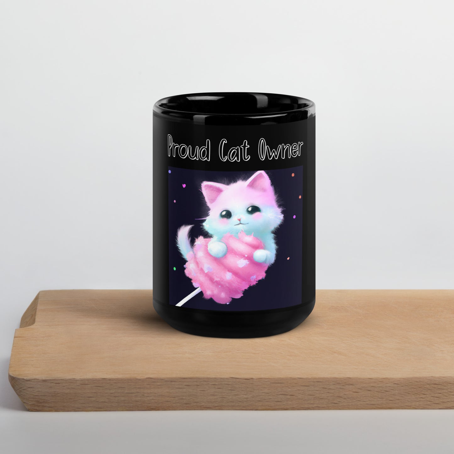 Black Glossy Mug with Kitten On A Cotton Candy with a text "Proud Cat Owner" at $25.97 found at Personalizedpetlovergifts