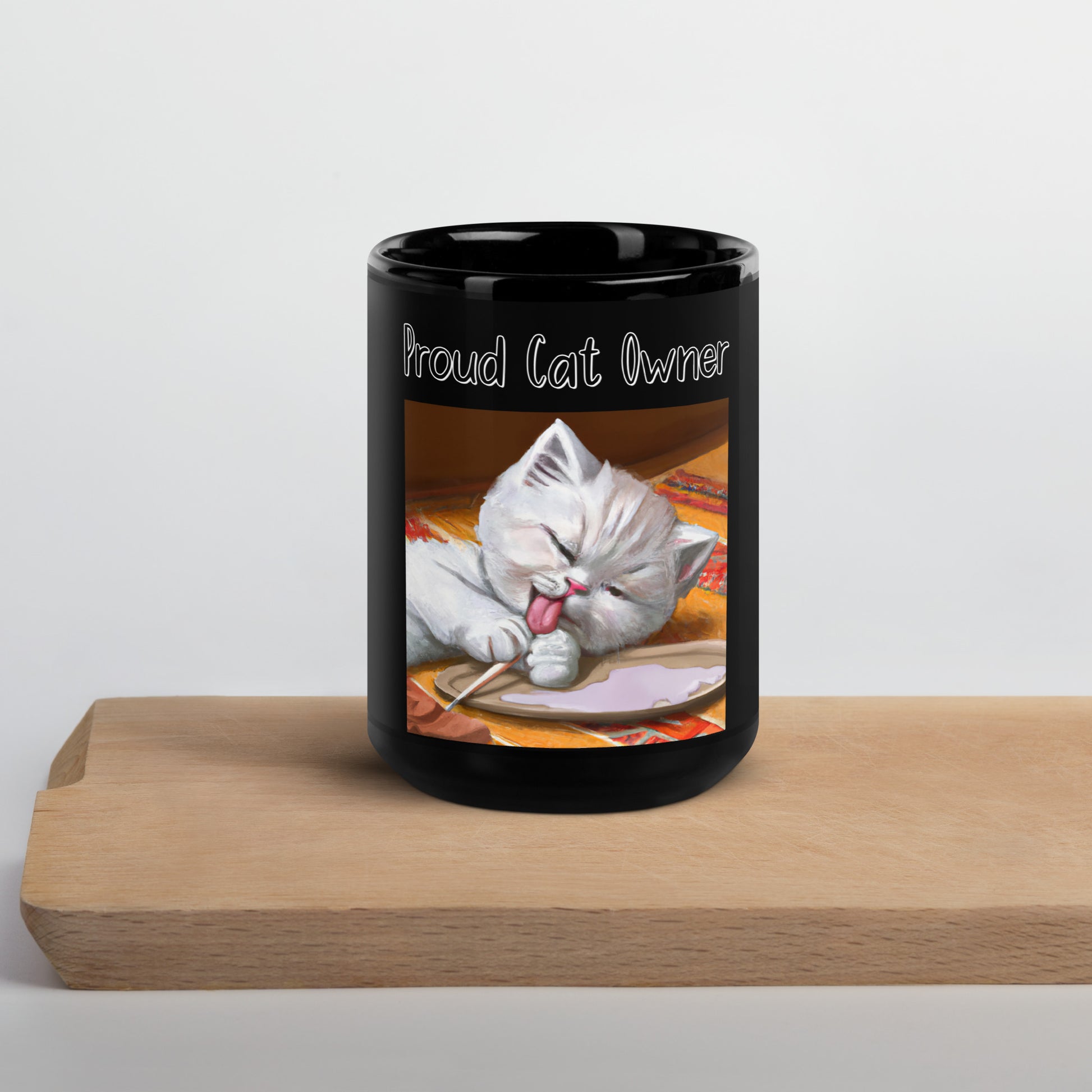 Black Glossy Mug with Kitten Licking Its Paws with a text "Proud Cat Owner" at $25.97 found at Personalizedpetlovergifts