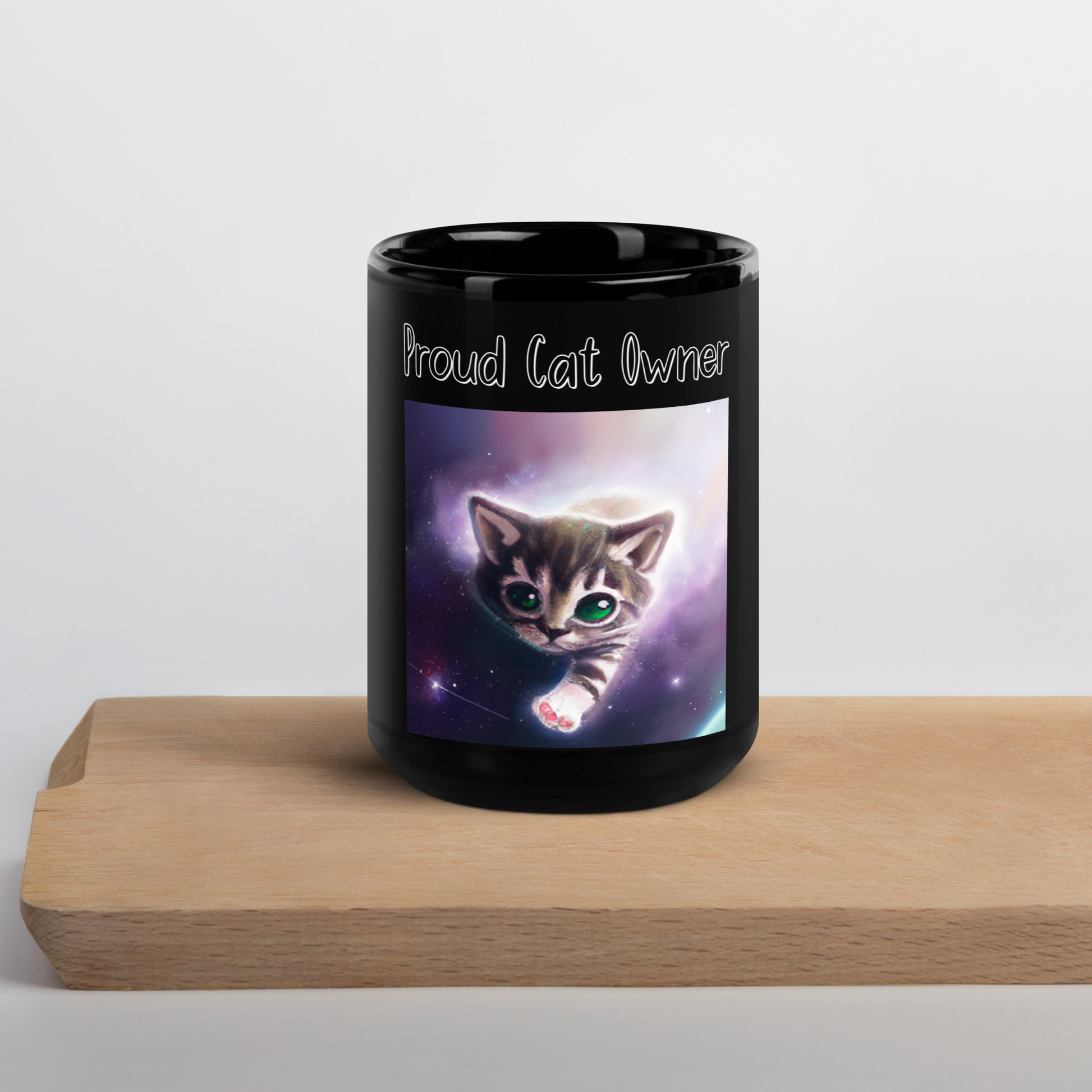 Black Glossy Mug with Kitten In The Space with a text "Proud Cat Owner" at $25.97 found at Personalizedpetlovergifts