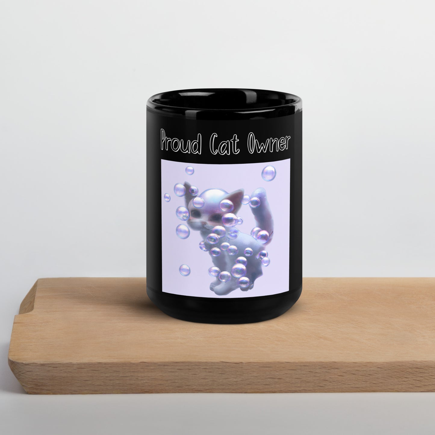 Black Glossy Mug with Kitten In Soap Bubbles with a text "Proud Cat Owner" at $25.97 found at Personalizedpetlovergifts