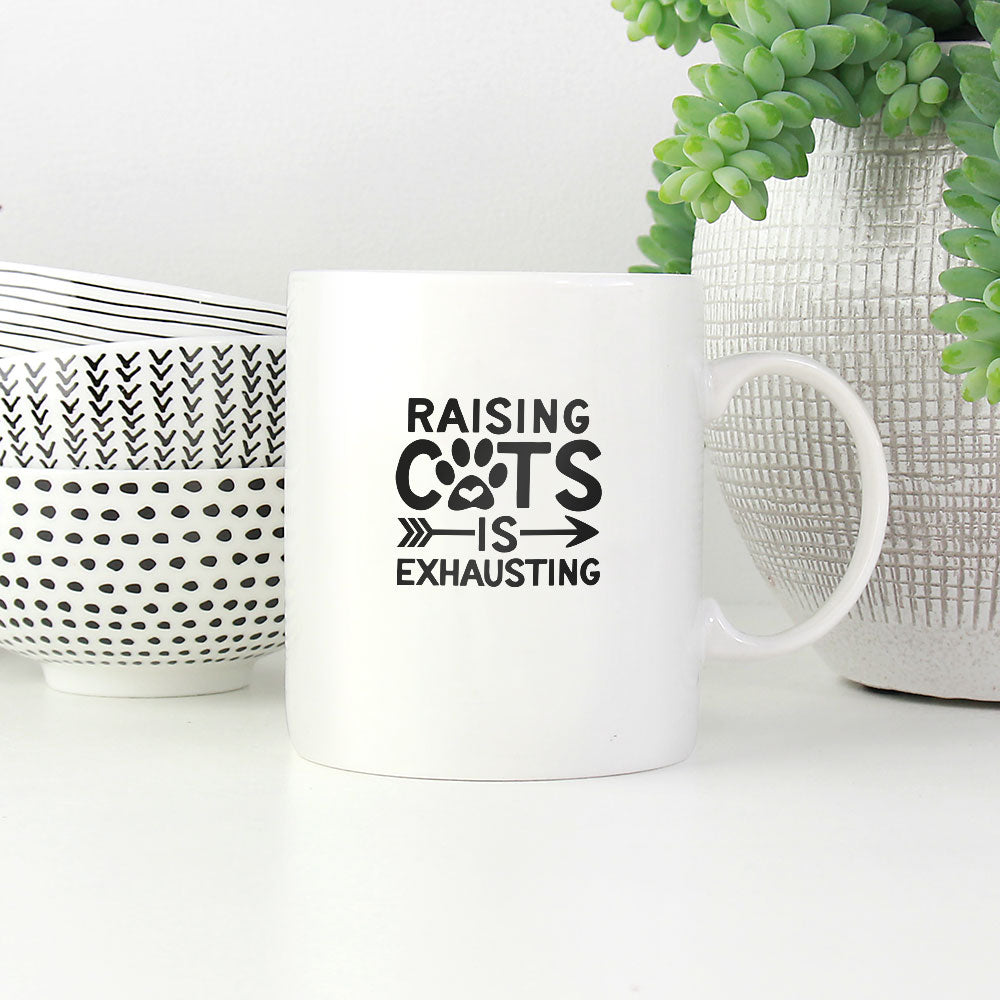 raising cats is exhausting Coffee Mug at $13.95 found at Personalizedpetlovergifts